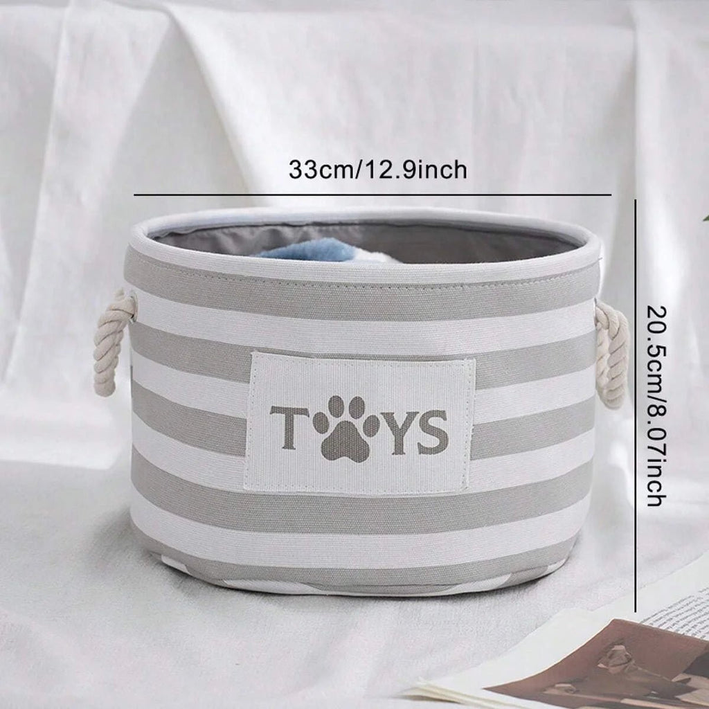 Detalhe da alça reforçada da cesta dobrável para brinquedos de pets facilitando o transporte