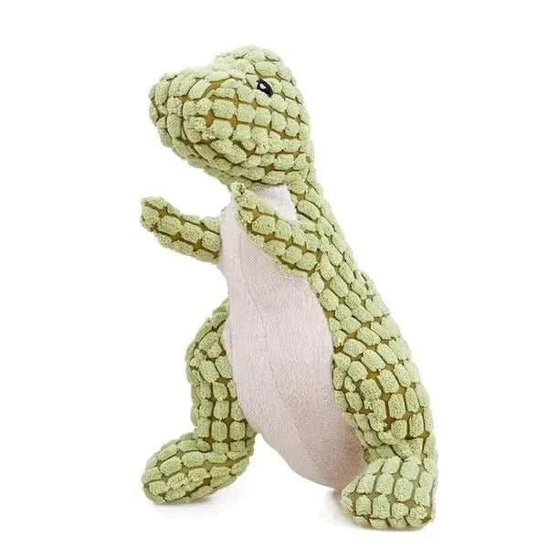 Vista lateral do brinquedo de pelúcia para cães Dino com apito, mostrando detalhes do acabamento